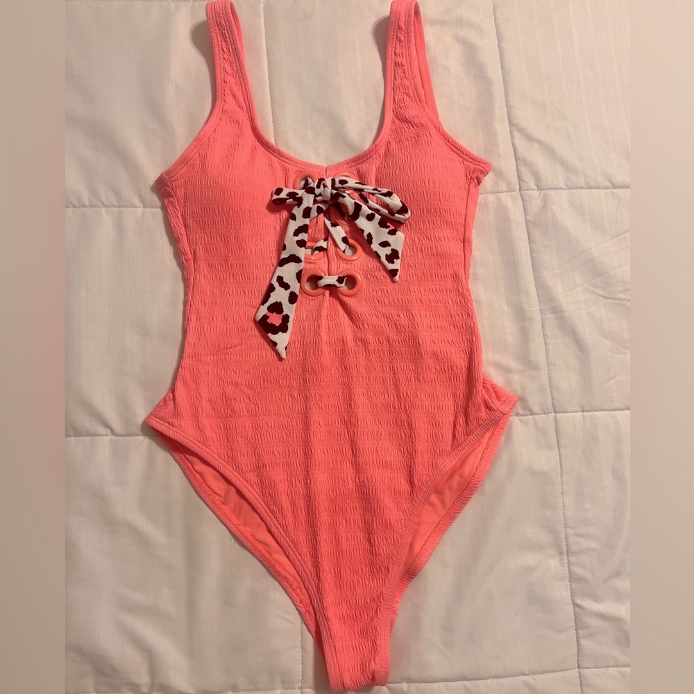 Super cute bright pink one piece!